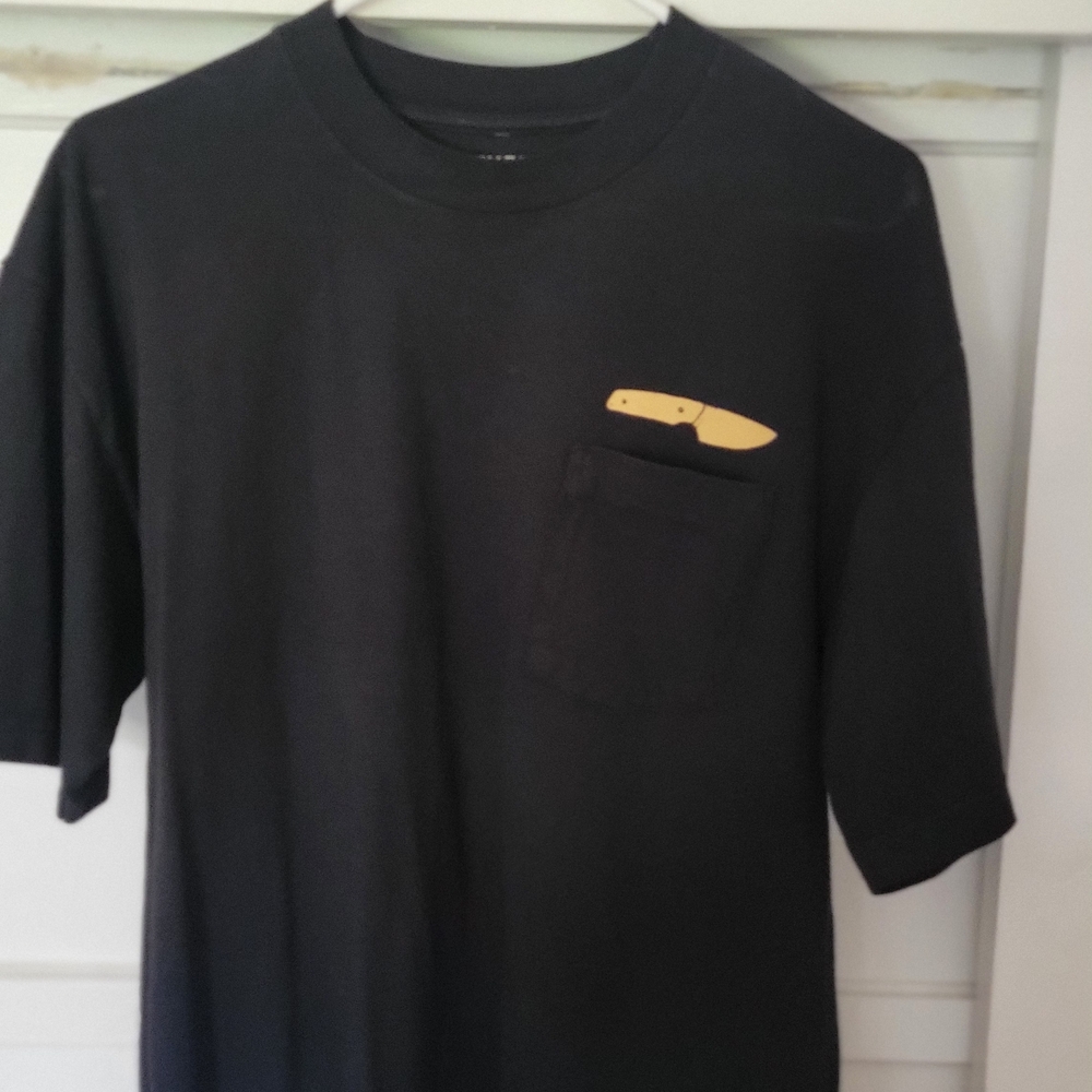 Men's Black Short-Sleeve Pocket Tee with Yellow Knife Detail